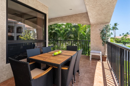 Step onto your private balcony where tropical breezes meet open-air dining. Gather around the spacious table, surrounded by lush palms and garden views—your perfect spot for morning coffee or sunset meals.