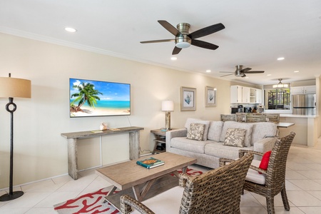 - Watch your favorite show on the flat screen while enjoying cool ceiling fans - Comfortable seating and a bright open layout invite you to gather and relax - Kitchen and hallway access make this a convenient hub for your island stay