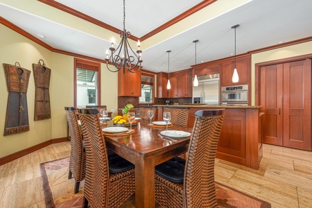 Gather around this beautiful dining table, near the fully equipped gourmet kitchen.