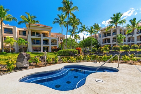 Private hot tub surrounded by tropical gardens and swaying palms awaits your ultimate island relaxation under endless blue skies.