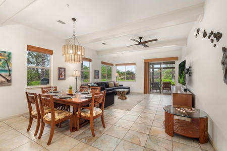 Relax in your bright, open living space where warm wood tones meet modern comfort, perfect for gathering with loved ones.