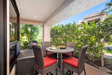 Unwind on your private covered patio with tropical garden views, perfect for morning coffee or evening meals.
