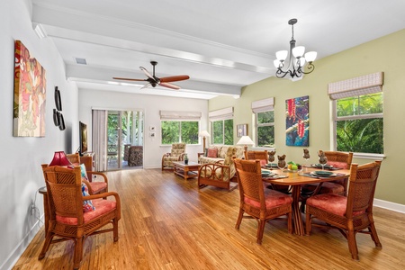 Open concept layout connects living room, dining, and kitchen