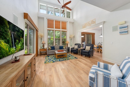 Relax in your bright, airy living space with soaring ceilings, warm wood floors, and cozy seating perfect for unwinding after adventure.