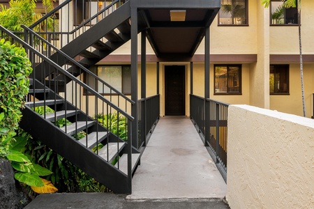 Stair access leading to private entry.