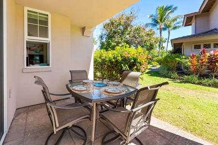 Covered lanai with tropical landscaping