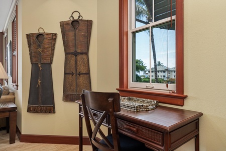 Your private workspace awaits, where tropical breezes drift through the window and warm island light brightens your day. Thoughtful touches create a peaceful corner for planning adventures or unwinding.
