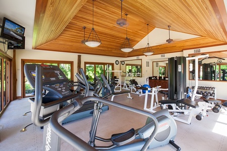 Fully equipped fitness center with cardio and strength machines.