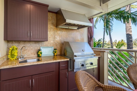 Covered lanai with BBQ and golf course views