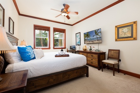 - Bedroom with king bed, crisp white bedding, and tropical accent pillows   - Ceiling fan, wooden furnishings, and soft lighting add comfort and charm   - Double windows bring in beautiful garden views and island breezes
