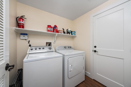 Your dedicated laundry room keeps clothes fresh with full-size washer and dryer, plus organized storage for all your vacation essentials.