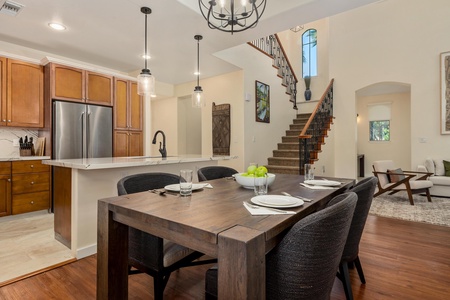 Your open-concept kitchen and dining area creates the perfect space for memorable meals together, with elegant fixtures and thoughtful details throughout.