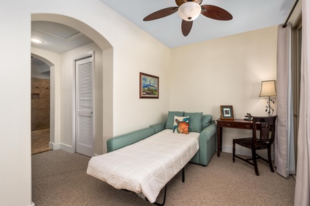 Primary suite with king bed and lounge area