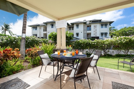 - Outdoor dining area with cushioned chairs and garden views   - Perfect spot for enjoying breakfast in the sunshine or evening drinks   - Open air design blends comfort and nature for memorable meals