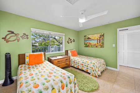 Cozy and cheerful twin guest bedroom.