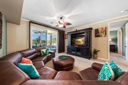 Bright living room with sliding doors to lanai