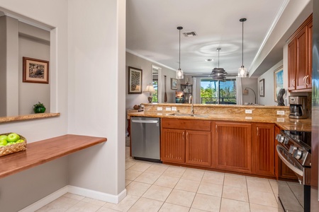 Your gourmet kitchen awaits with granite counters, stainless appliances, and warm wood cabinets—perfect for creating memorable meals together.