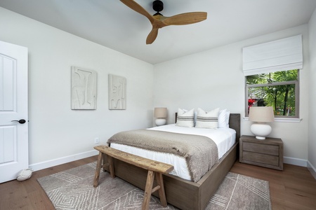 Drift off peacefully in your serene bedroom, where crisp linens and warm wood tones create the perfect retreat after exploring.