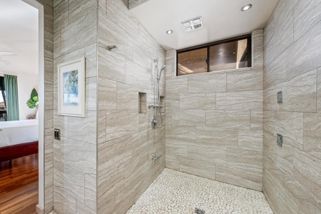 Ensuite primary bathroom with walk-in shower