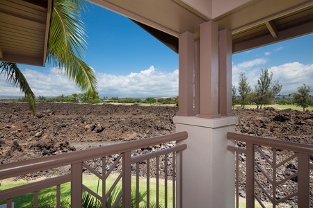 - Step onto your private balcony for a scenic view of ancient lava rock landscapes - Palm trees sway in the breeze while distant mountains line the horizon - Perfect spot for morning coffee or a peaceful sunset moment