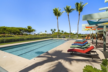 Lap pool with palm tree views.