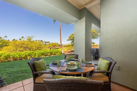 Covered lanai with garden views