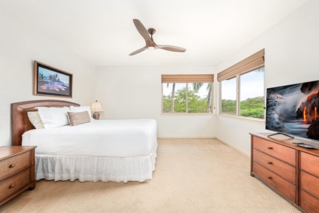 Drift off to sleep in your comfortable bed while tropical breezes flow through bamboo blinds and lush garden views.