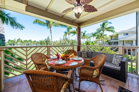 Covered lanai with BBQ and golf course views