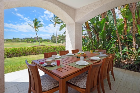 - Spacious covered lanai dining area with a large table for eight and plush seating - Surrounded by tropical greenery and swaying palms, private vibe - Perfect for alfresco dinners, morning coffee, or sunset appetizers with friends