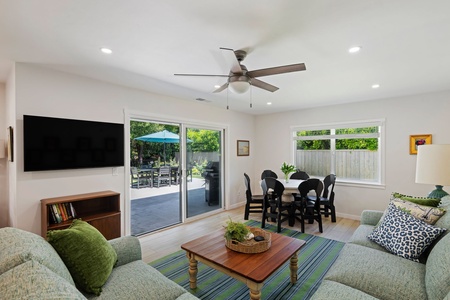Relax in your bright, open living space with cozy seating, dining for six, and seamless access to your private backyard oasis.