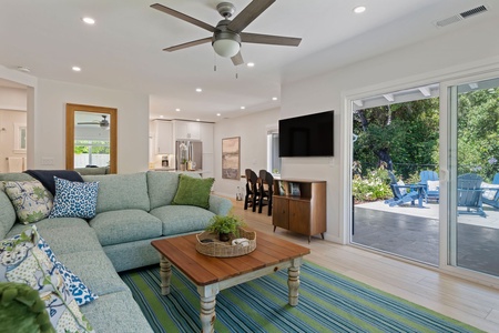 Relax in your bright, open living space with comfortable sectional seating and seamless access to your private patio oasis.
