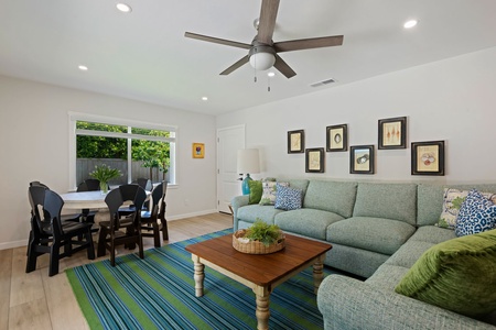 Sink into this spacious open living area where you'll love the bright natural light and comfortable seating for relaxing after your adventures.