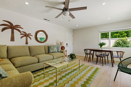 Unwind in your bright, cheerful living space with tropical touches and dining area perfect for morning coffee or evening meals together.