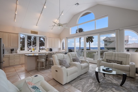 Living Room - Enjoy high ceilings & water views