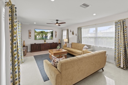 Spacious Living Room With Large Smart TV