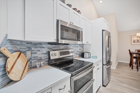 Kitchen fully stocked with everything you should need to make a nice home cooked meal