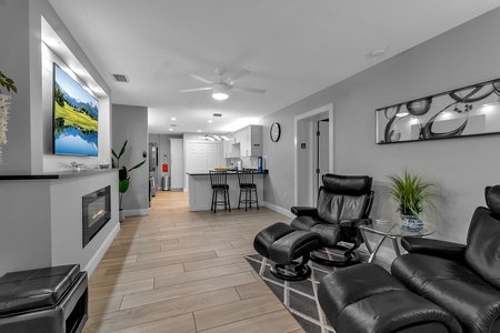 Relaxing Common Area with TV and Fire Place
