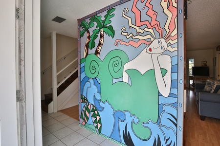 Entry way art Mural through front door, giving the house it's name: Crazy Mermaid!