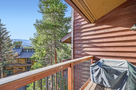 Step out onto the private balcony and soak in peaceful views of the surrounding trees—a perfect spot for morning coffee or an evening glass of wine.