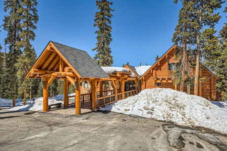 Charming Front Exterior Featuring a Unique Bridge Entry