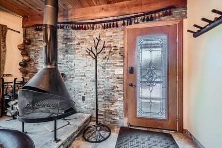 Inviting Foyer with Unique Fireplace
