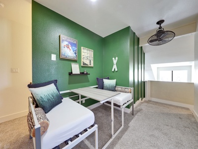 Upstairs sitting area offering a cozy space to relax and unwind