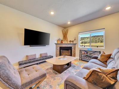 View of Living Room with Gas Fire Place, Mountain Views and 65" Flat Screen TV