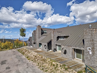 Front view of the Cedar Village Complex, showcasing the walk-out decks