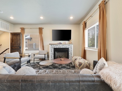 View of Great Room, Ample Seating, Gas Fireplace, 64" Smart TV