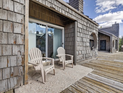 Relax on the outdoor walk-out deck with your own private seating area