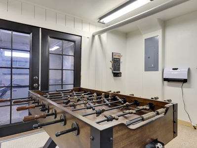 View of Game Room with Foosball table, space Heater and Ping Pong Table