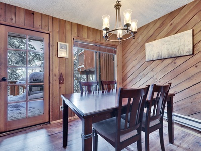 Dining area with seating for four guests