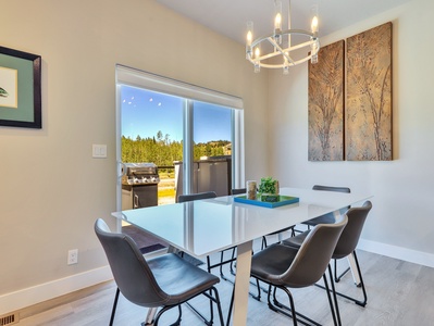 View of Dining Room with Seating for 6 and Walk-Out Deck