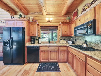 Kitchen with Updated Appliances: Dishwasher, Gas Stove, Microwave and French Door Refrigerator/Freezer, Double Ovens and